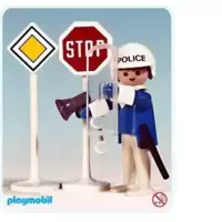 Policeman with 2 road signs
