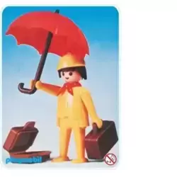 Voyageur avec parapluie