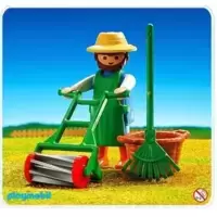 Gardener with Lawnmower