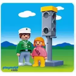 Policeman and kids at the traffic light