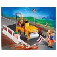 Road workers with steamroller