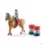 Barrel racing avec une cowgirl