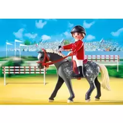Trakehner Horse with Equestrienne and Stable