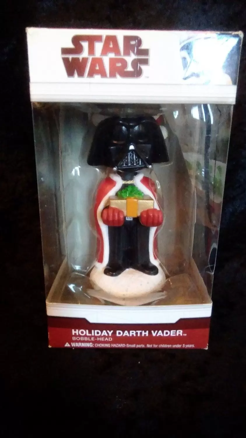 Wacky Wobbler Star Wars - Star Wars - Darth Vader Holiday holding present