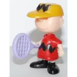 Charlie Brown avec raquette de tennis