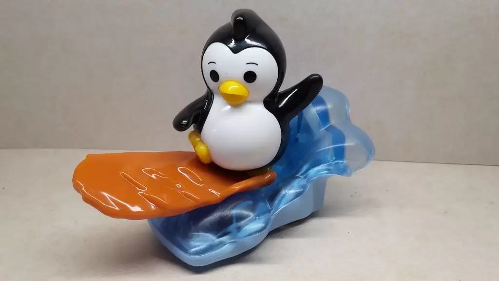 Maxi Kinder - Les pingouins cool - Pingouin avec un surf