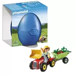 Boy with children's tractor
