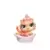 POMERANIAN IN A LIGHT PINK BED