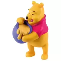 Winnie l'Ourson avec pot de miel