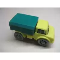 Camion jaune bâche verte