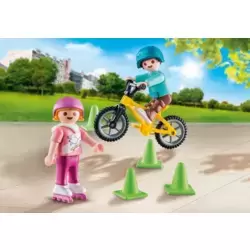 Kids with rollers and BMX