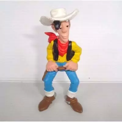 Lucky Luke - Lucky Luke mains sur la ceinture