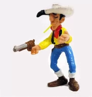 Lucky Luke - Lucky Luke tenant un colt et avec une paille