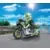 Green motorcycle and pilote
