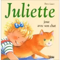 Juliette joue avec son chat