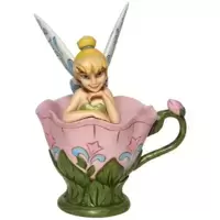 Tinkerbell Sitting In A Flower