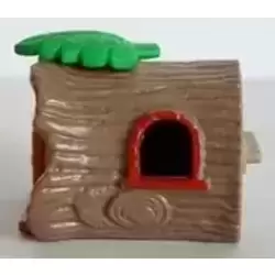 Light green leaf tree trunk and sprite with hammer