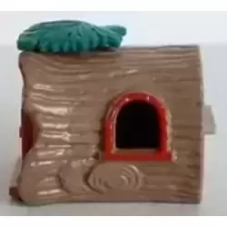 Dark green leaf tree trunk and pixie with hammer