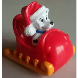Dalmatian In a red sleigh with orange runners