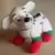 Dalmatian Wearing plush red/green mitten stocking/standing on all 4 feet