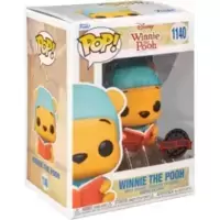 Winnie The Pooh - Winnie reading a Book
