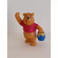 Winnie l'ourson avec pot de miel