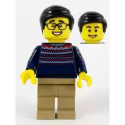 Man, Dark Blue Sweater, Dark Tan Legs, Black Hair, Glasses