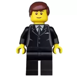 Suit Black, Reddish Brown Male Hair, Black Eyebrows, Thin Grin