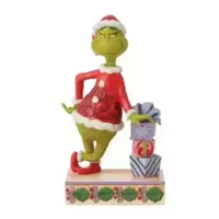 Grinch Leaning on Gifts