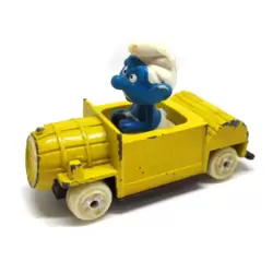 Smurf in yellow car