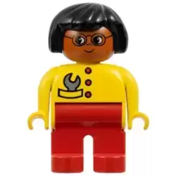 Duplo Figure - Female, Adult Woman, Red Legs, Yellow Top with Buttons and Wrench in Pocket Pattern, Black Hair, Dark Orange Head (75510)
