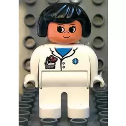 Duplo Figure, Female Medic, White Legs, White Top with Pocket and EMT Star of Life Pattern, Black Hair
