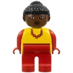 Duplo Figure, Female, Red Legs, Yellow Top with Red Necklace, Black Curly Hair in Bun, Brown Head