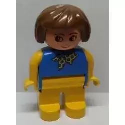 Duplo Figure, Female, Yellow Legs, Blue Top With Yellow and Blue Polka Dot Scarf, Yellow Arms, Brown Hair, no Nose, no White in Eyes Pattern