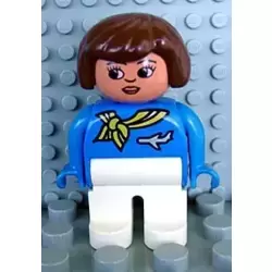 Duplo Figure, Flight Attendant - Female, White Legs, Blue Top with Scarf with Stripe and Jet Airplane Pin Pattern, Brown Hair, Nougat Head with Lips and Turned Down Nose