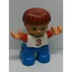 Duplo Figure Lego Ville, Child Boy, Blue Legs, White Top with Red Number 3 Pattern, Dark Red Hair (6013303)