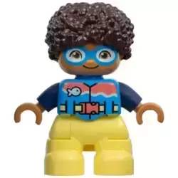 Duplo Figure Lego Ville, Child Boy, Bright Light Yellow Legs, Dark Azure Vest and Goggles, Dark Blue Arms, Dark Brown Hair (6449847)