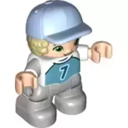 Duplo Figure Lego Ville, Child Boy, Light Bluish Gray Legs, Medium Azure Top with Number 7, Tan Hair, Bright Light Blue Cap (6349785)