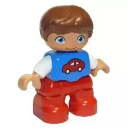 Duplo Figure Lego Ville, Child Boy, Red Legs, Blue Top with Red Car Pattern, Reddish Brown Hair