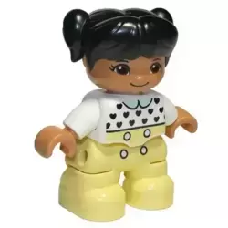 Duplo Figure Lego Ville, Child Girl, Bright Light Yellow Legs, White Top with Black Hearts, Black Hair with Pigtails, Medium Nougat Skin