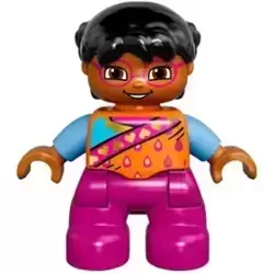 Duplo Figure Lego Ville, Child Girl, Magenta Legs and Glasses, Orange Top, Black Hair