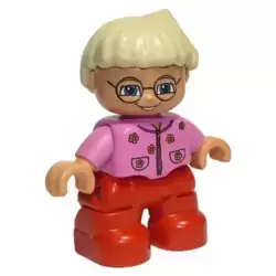 Duplo Figure Lego Ville, Child Girl, Red Legs, Dark Pink Top With Flowers, Light Blond Hair With Ponytail, Glasses