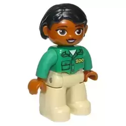 Duplo Figure Lego Ville, Female, Tan Legs, Green Top with 'ZOO' on Front, Brown Head, Black Hair, Brown Eyes, Oval Eyes