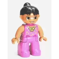 Duplo Figure Lego Ville, Female Tightrope Walker, Dark Pink Legs and Top with Gold Bow and Stars, Black Ponytail Hair, Brown Eyes