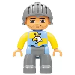 Duplo Figure Lego Ville, Male Castle, Dark Bluish Gray Legs, Blue and Yellow Chest with Crowned Eagle, Helmet