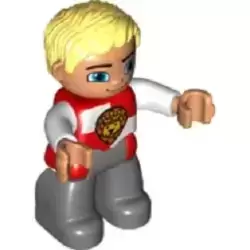 Duplo Figure Lego Ville, Male Castle, Dark Bluish Gray Legs, Red and White Chest with Lion on Shield, Bright Light Yellow Hair, Blue Eyes