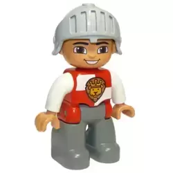 Duplo Figure Lego Ville, Male Castle, Dark Bluish Gray Legs, Red and White Chest with Lion on Shield, Helmet