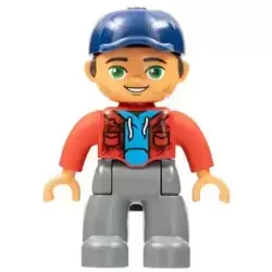 Duplo Figure Lego Ville, Male, Dark Bluish Gray Legs, Red Jacket, Medium Azure Shirt, Dark Blue Cap