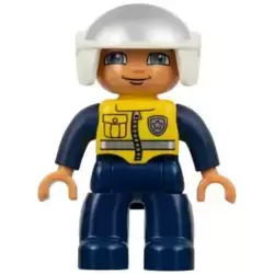 Duplo Figure Lego Ville, Male Police, Dark Blue Legs and Jumpsuit with Yellow Vest, White Helmet