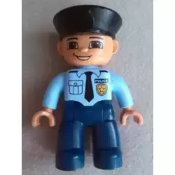 Duplo Figure Lego Ville, Male Police, Dark Blue Legs, Light Blue Top with Badge and Tie, Nougat Hands, Black Hat